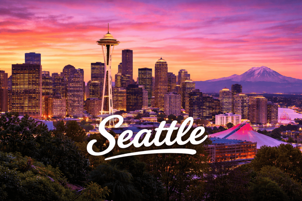 Seattle Washington skyline at sunset featuring the Space Needle and Mount Rainier